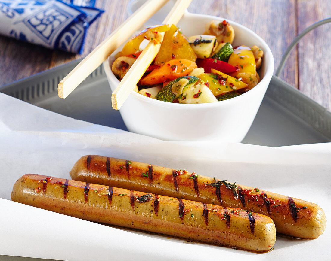 Vegan Thuringian sausages with a grilled vegetable salad