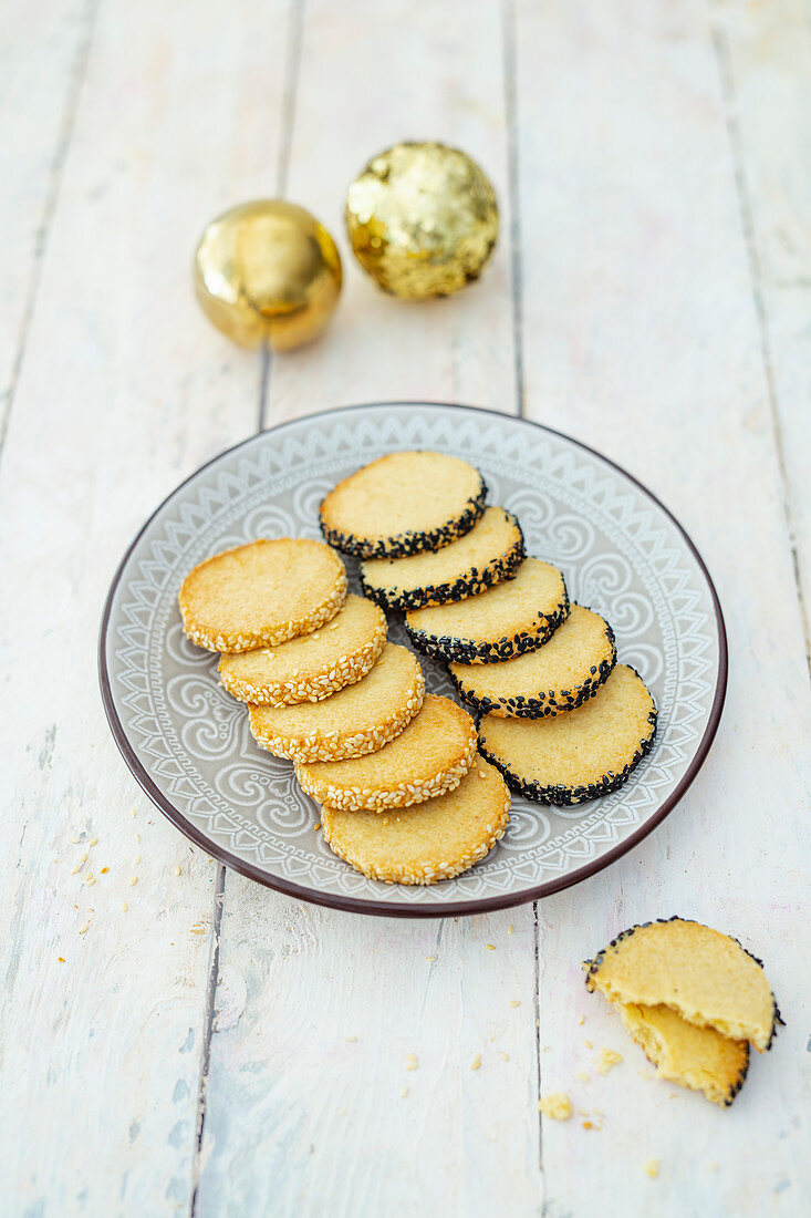 Marzipan biscuits with two types of sesame seeds for Christmas