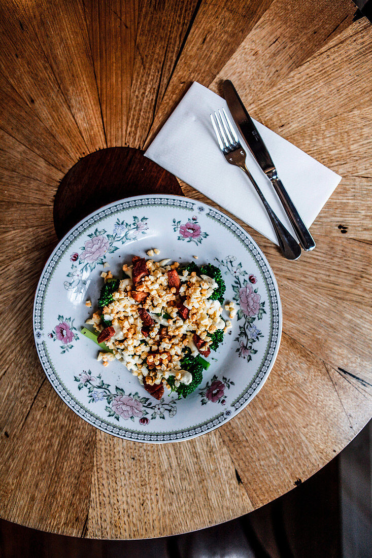 Broccolini with smoked pork, parmesan and chopped egg