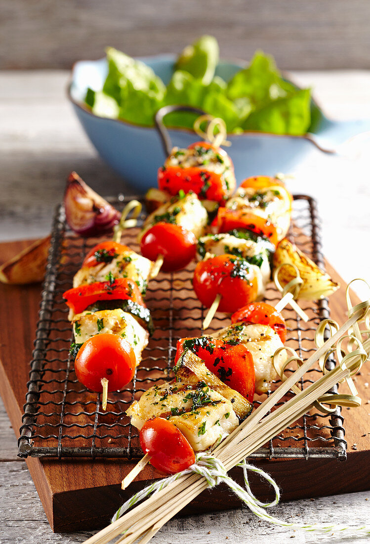 Grilled catfish skewers with peppers and tomatoes