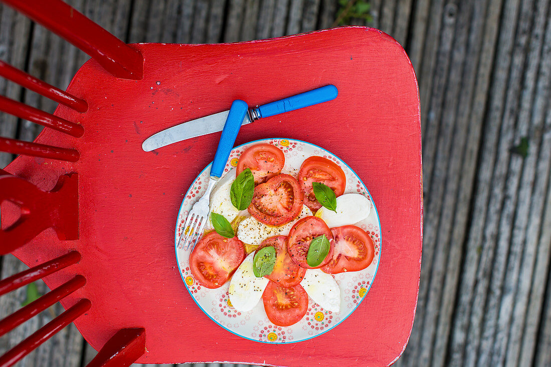 Tomatoes with mozzarella and basil