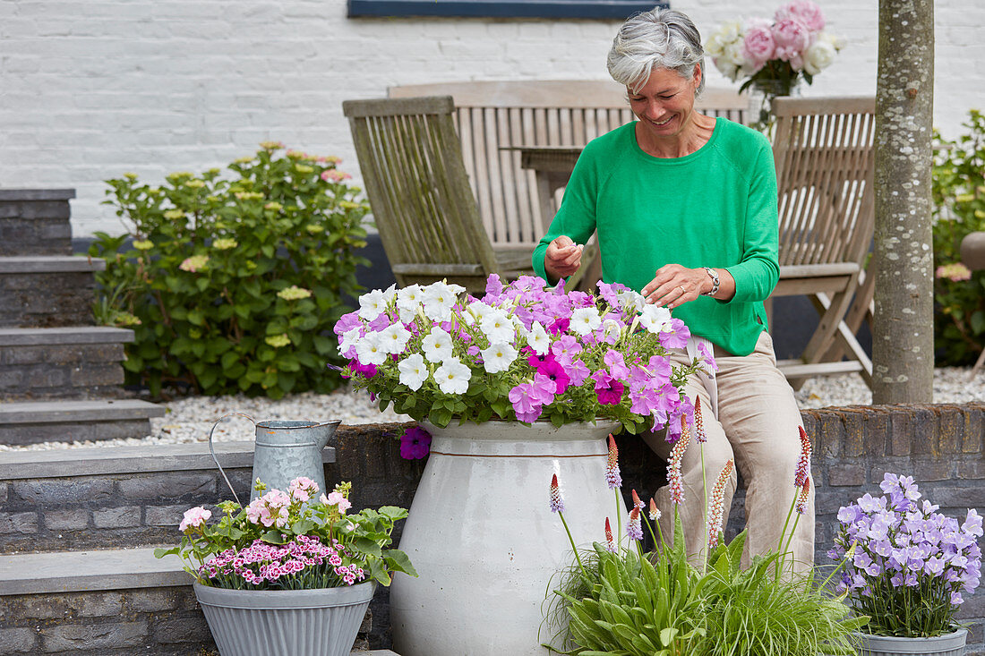 Lady picking flowers