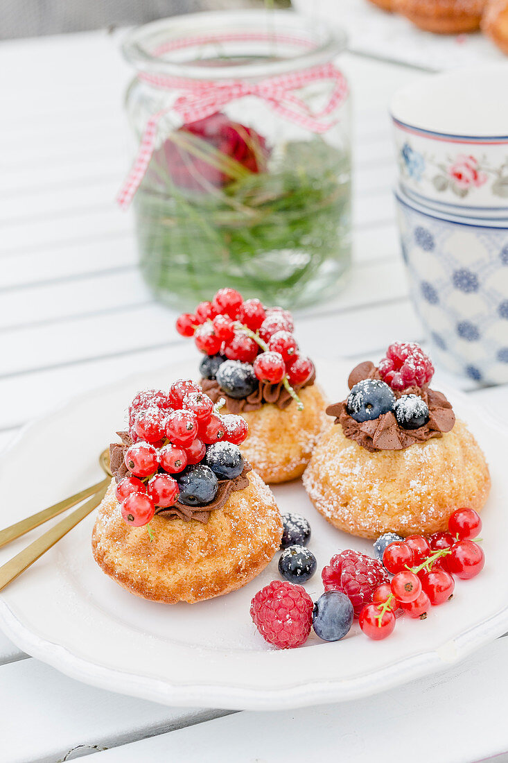 Mini Bundt cakes with chocolate mousse and berries