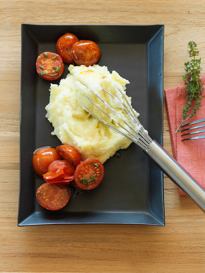 Mashed celeriac with thyme tomatoes