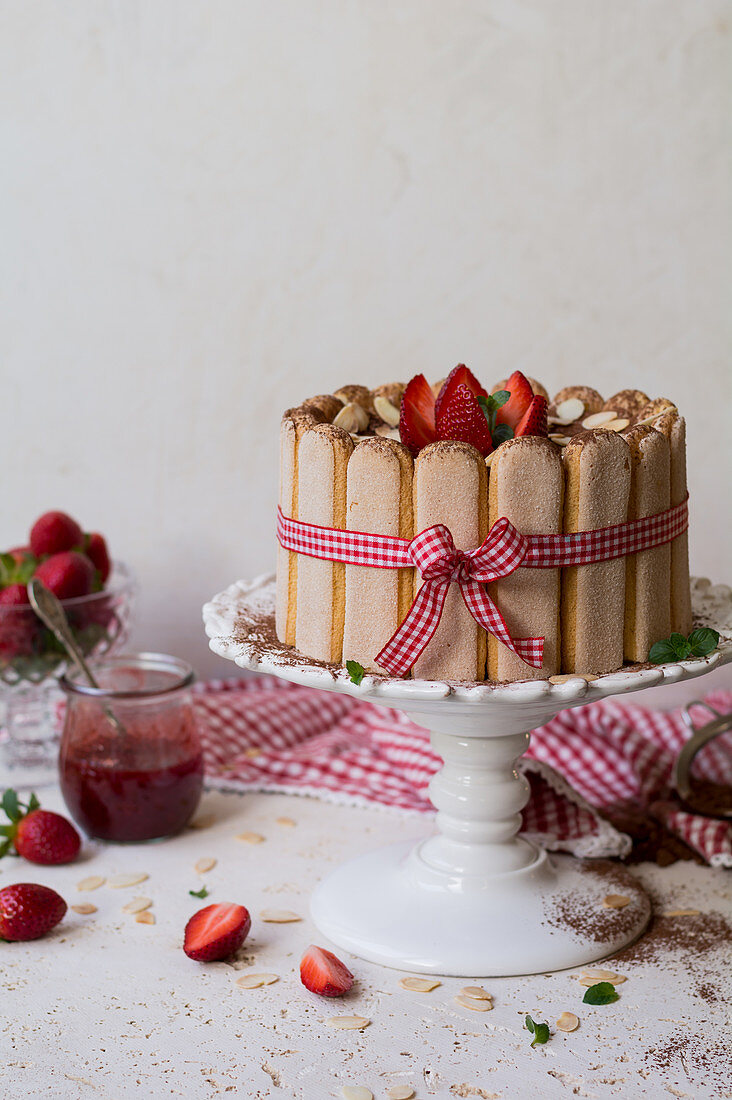 Strawberry charlotte on cake stand