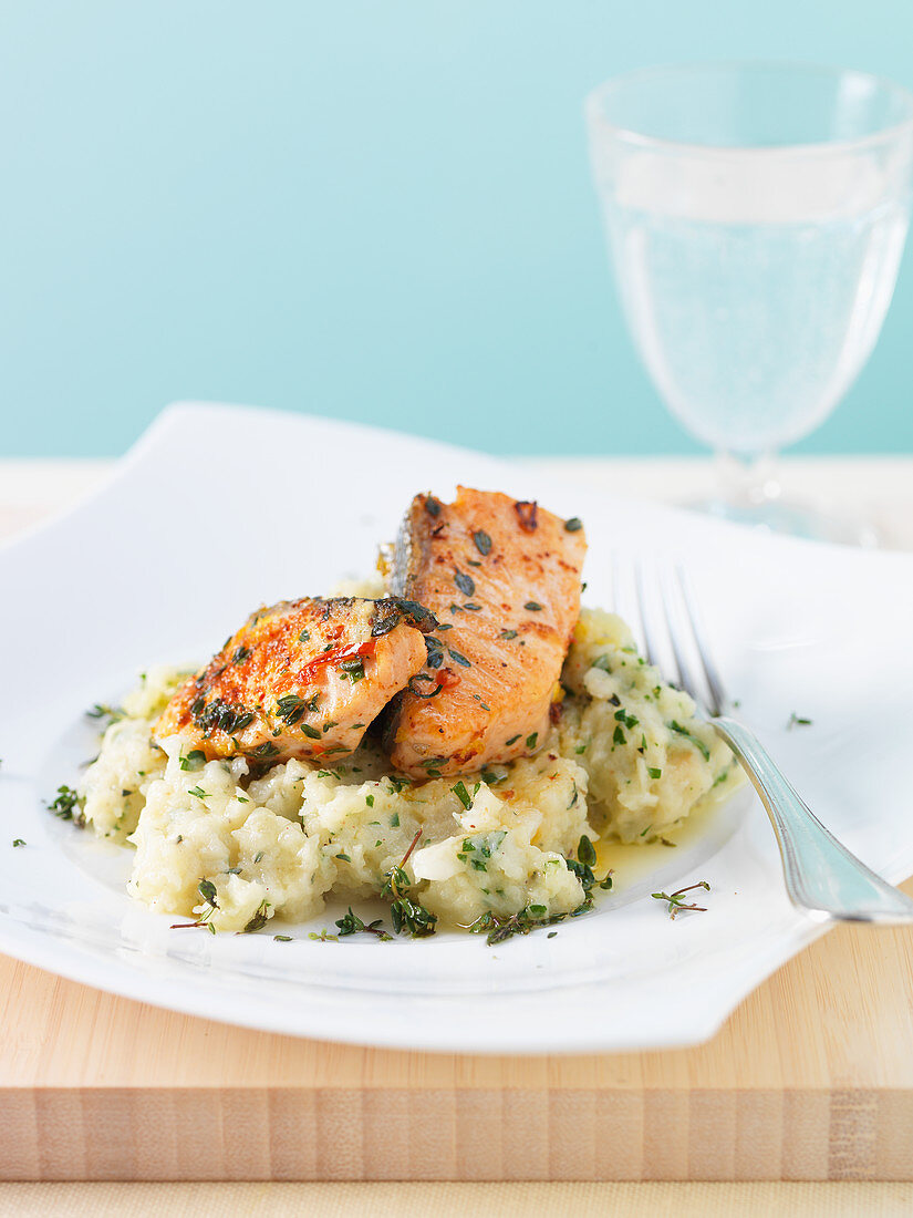 Mashed parsnips and celeriac with fried salmon