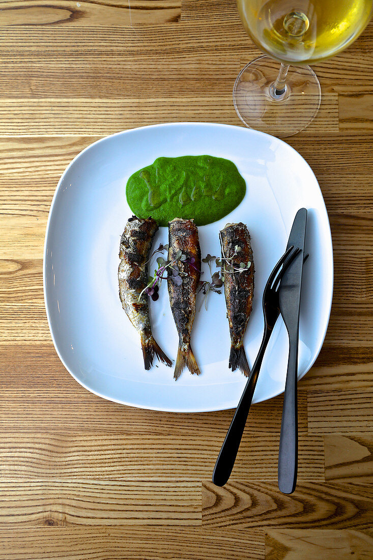 Grilled sardines with herb sauce