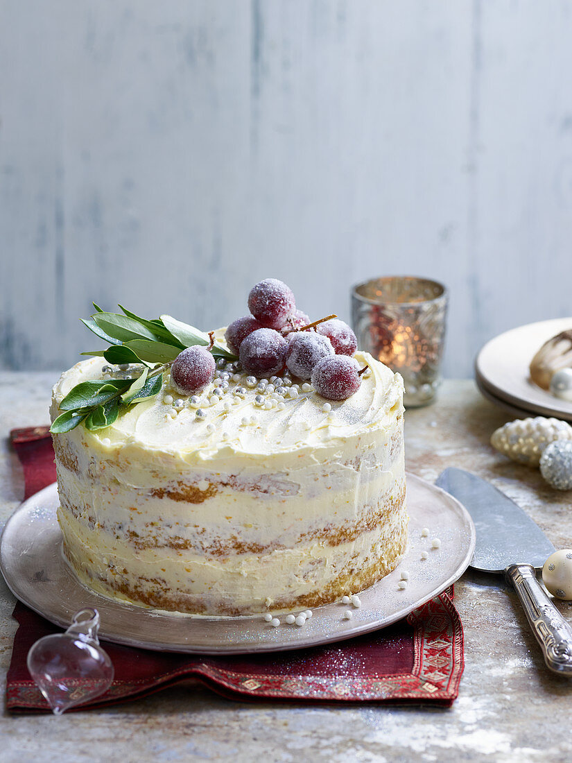 Pistachio and orange buttercream cake with candied grapes