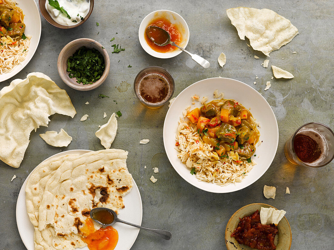 Pork and pumpkin curry with rice and unleavened bread