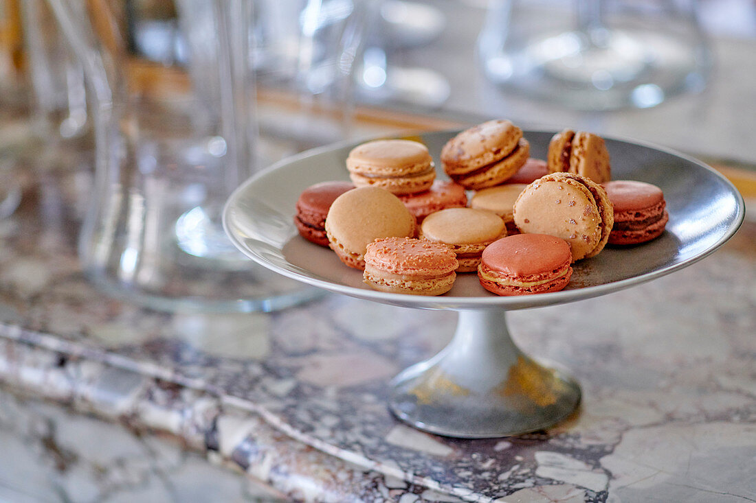 Macaroons in a bowl on a mantelpiece