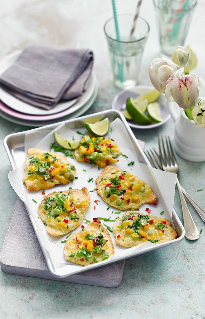 Corn fritters with sweetcorn kernels, spring onions, chives and chili