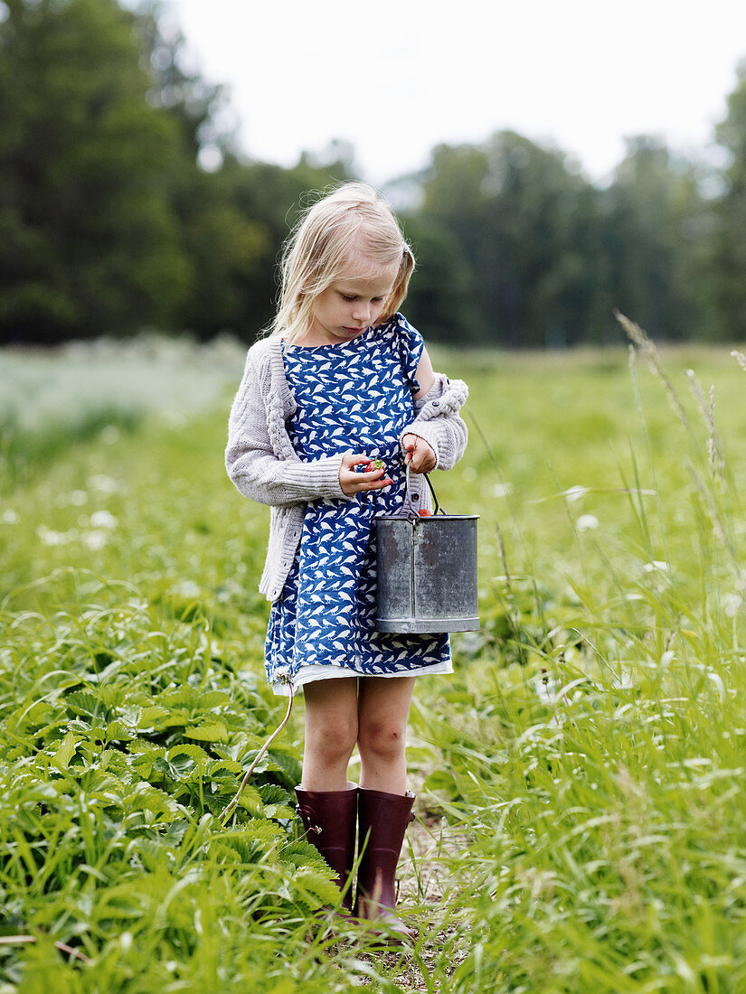 Girl with strawberries