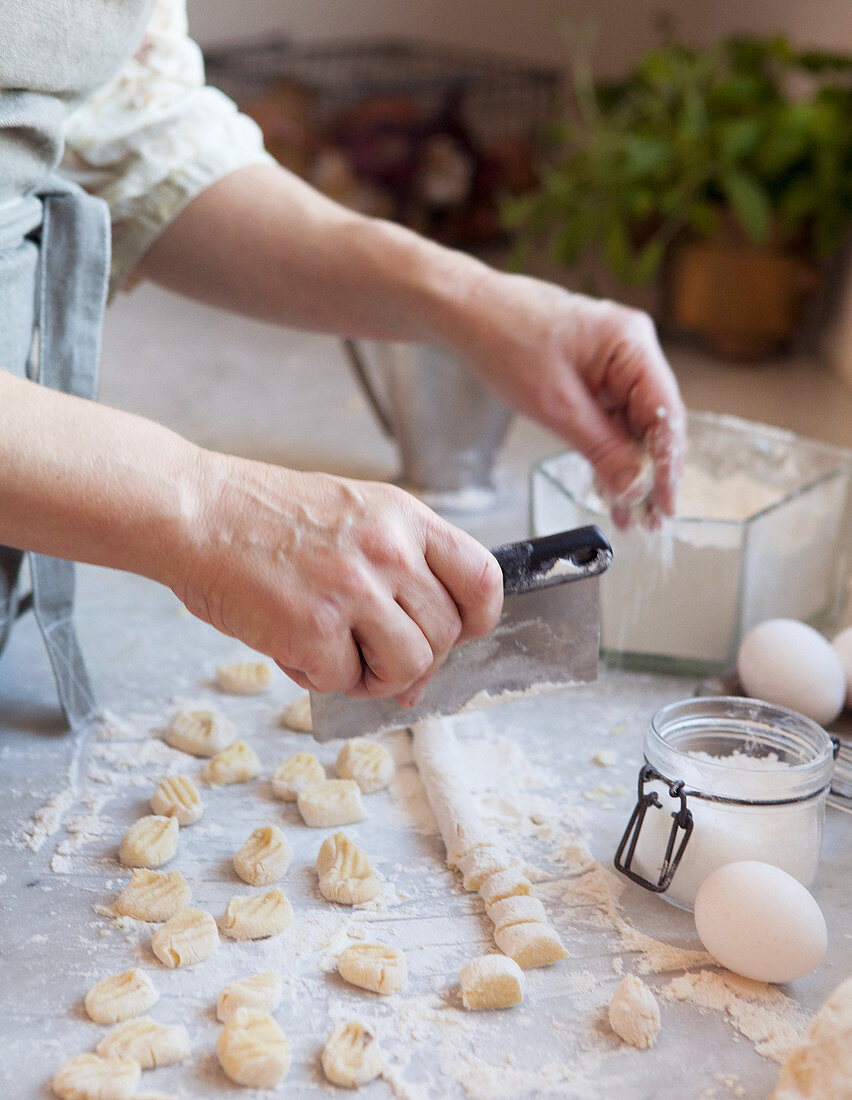 Woman making gnocchi