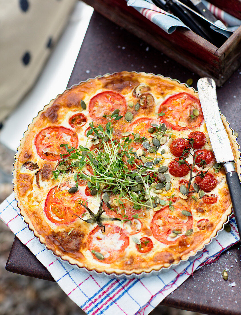 Quiche with tomatoes and cress