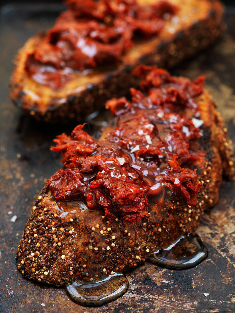 Crostini con la nduja (toasted bread with spicy raw sausage, Italy)