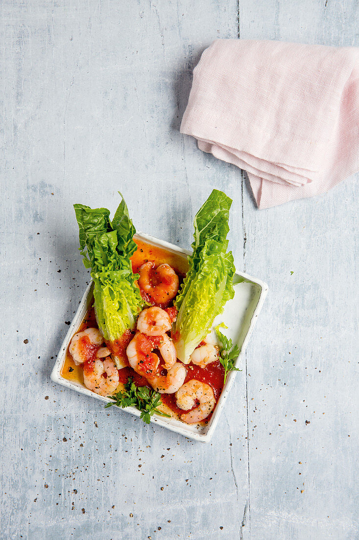 Sweet-and-sour prawns on a bed of salad