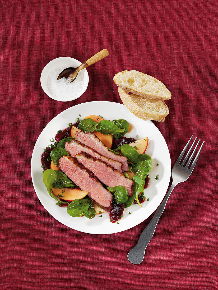 Duck breast with a beetroot and apple salad