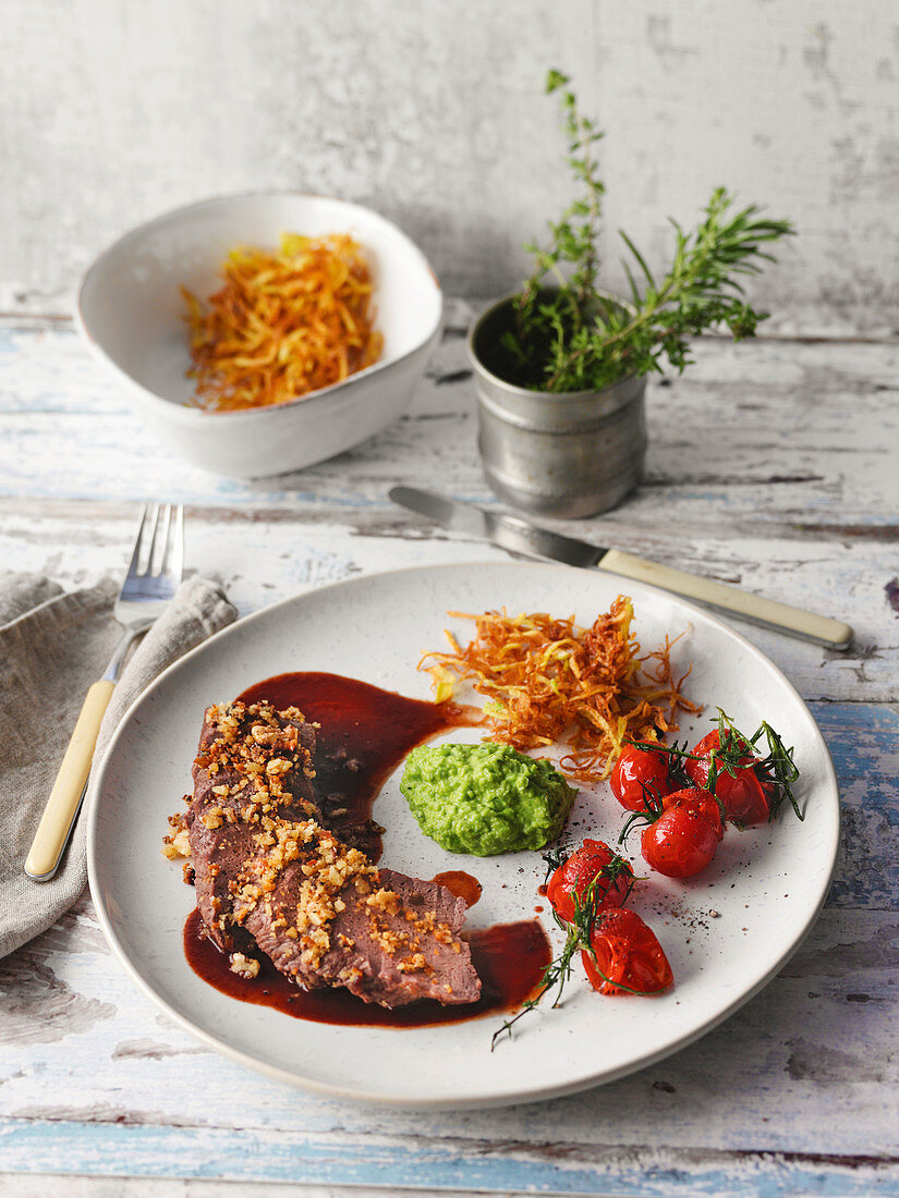 Saddle of mutton with a pretzel and nut crust