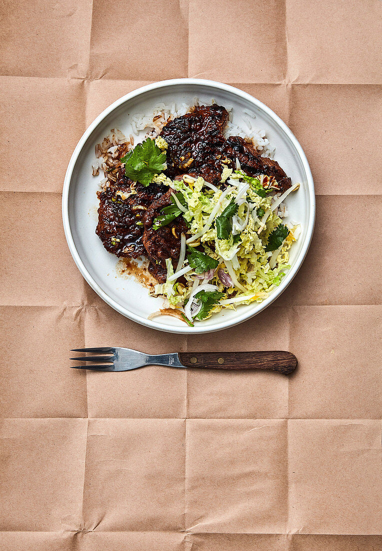 Korean style grilled Denver steak with coleslaw and rice