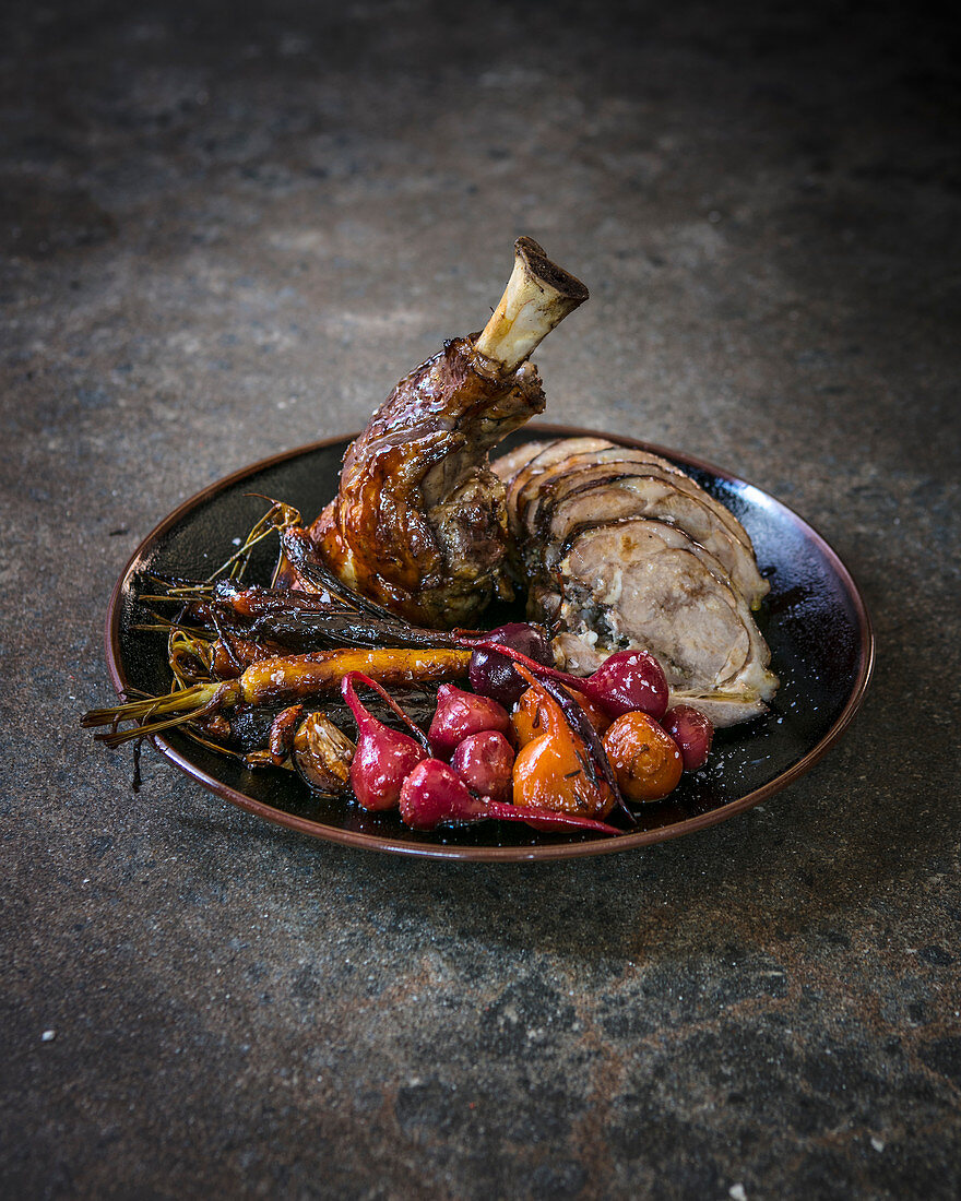 Saffron and orange-braised lamb shoulder with braised baby carrot and roasted beetroot