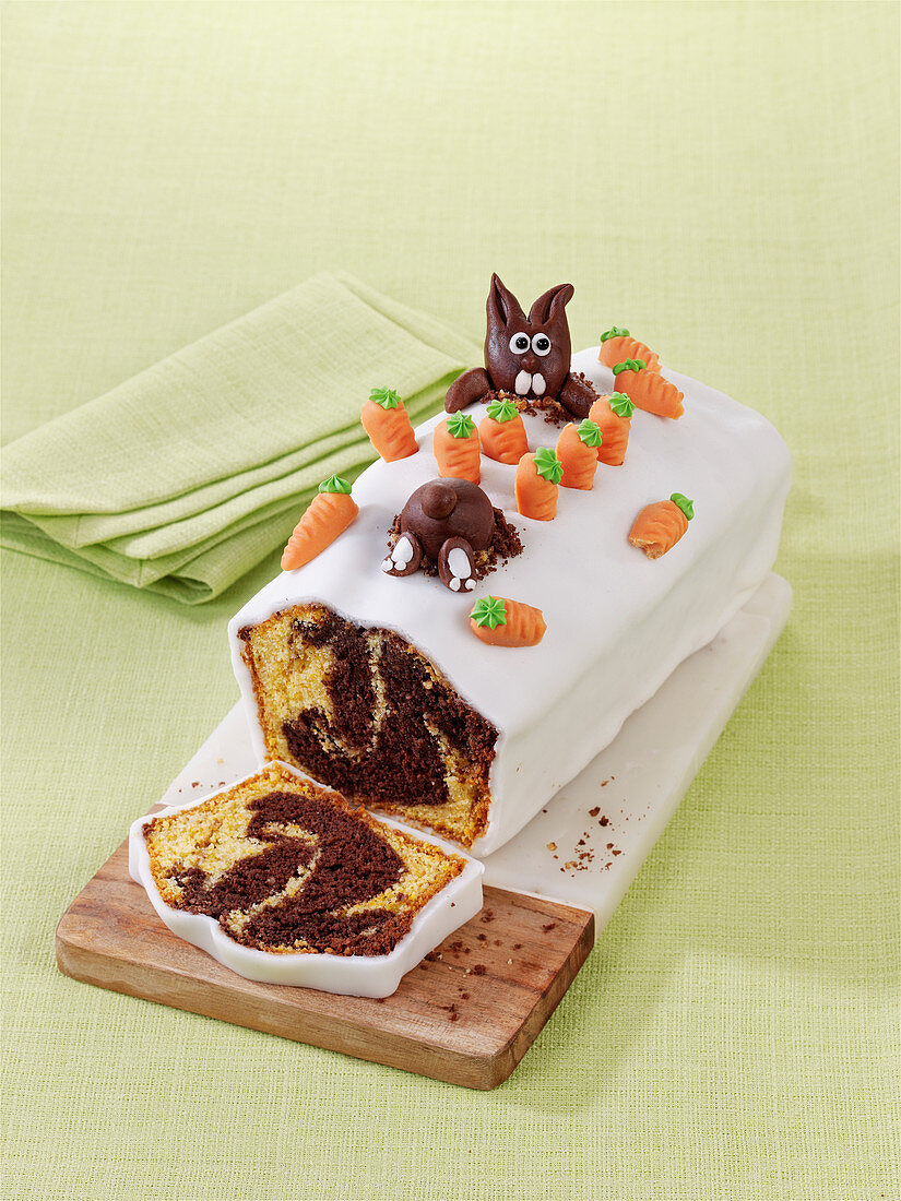 A marble cake decorated with rabbits