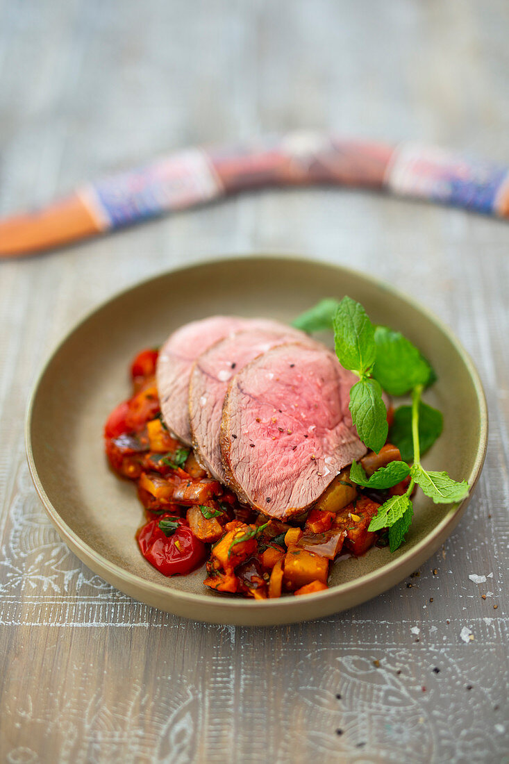 Leg of lamb on Caponata with mint (Australia)