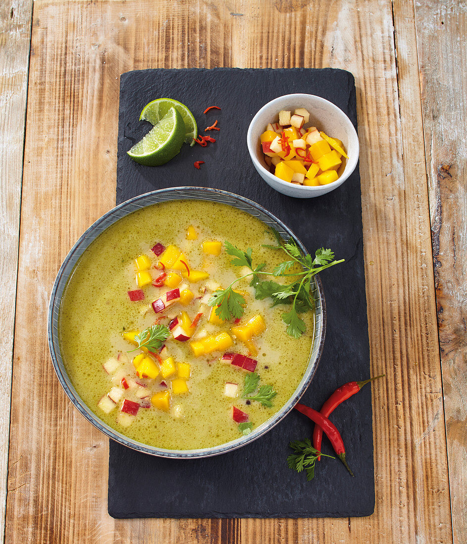 Fruity curry and coconut soup with mango, apple and lime