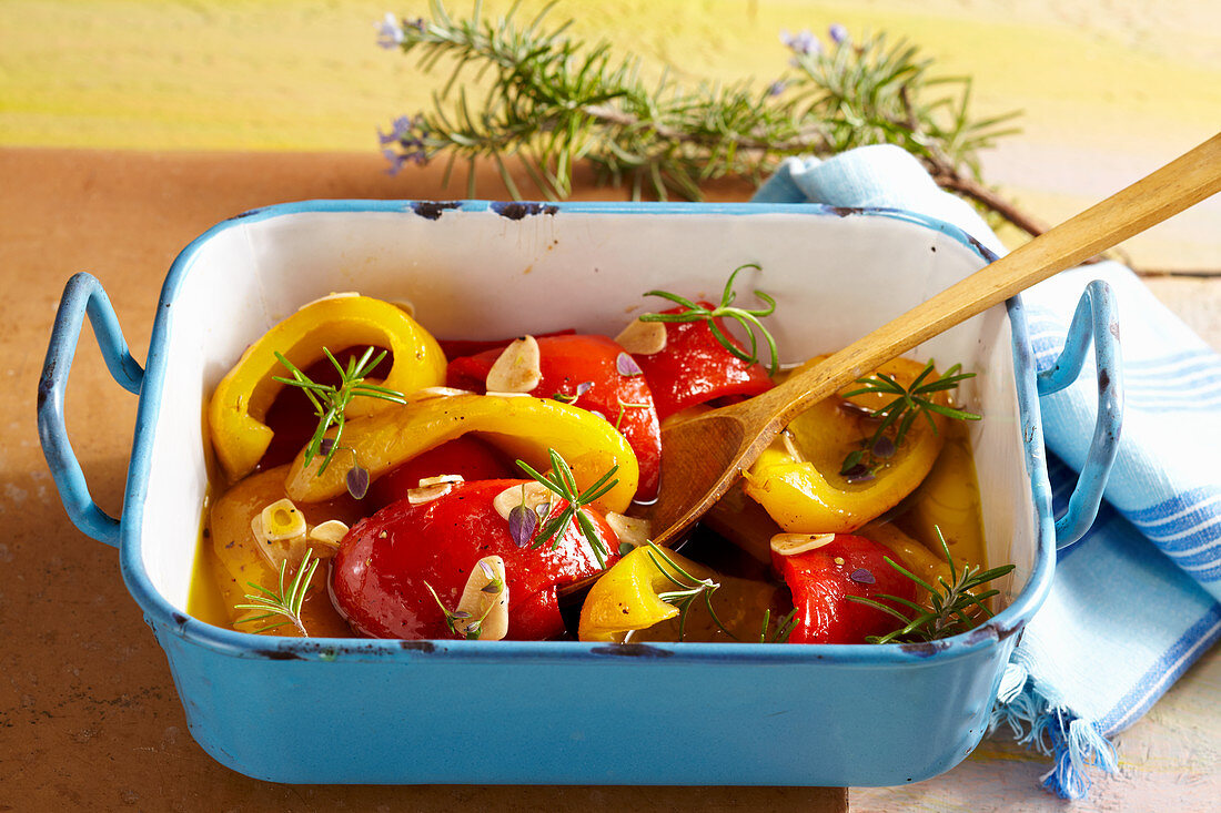 Marinated peppers with fresh herbs and olive oil