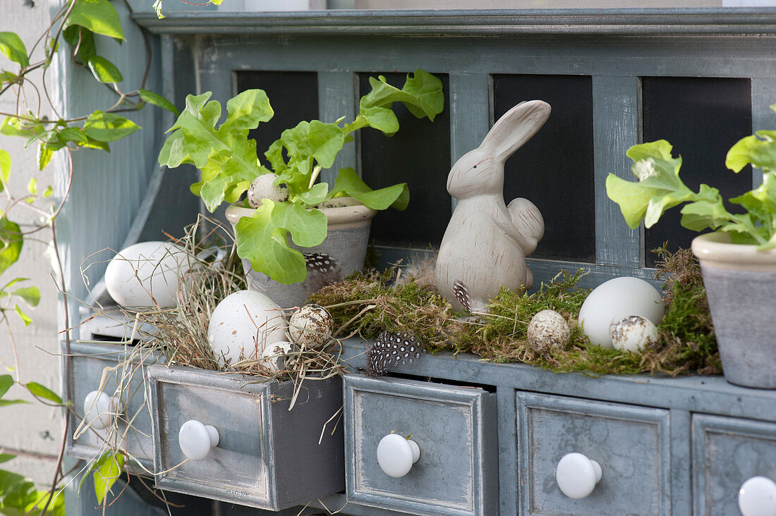 Small Easter decoration in the wall cupboard on the terrace