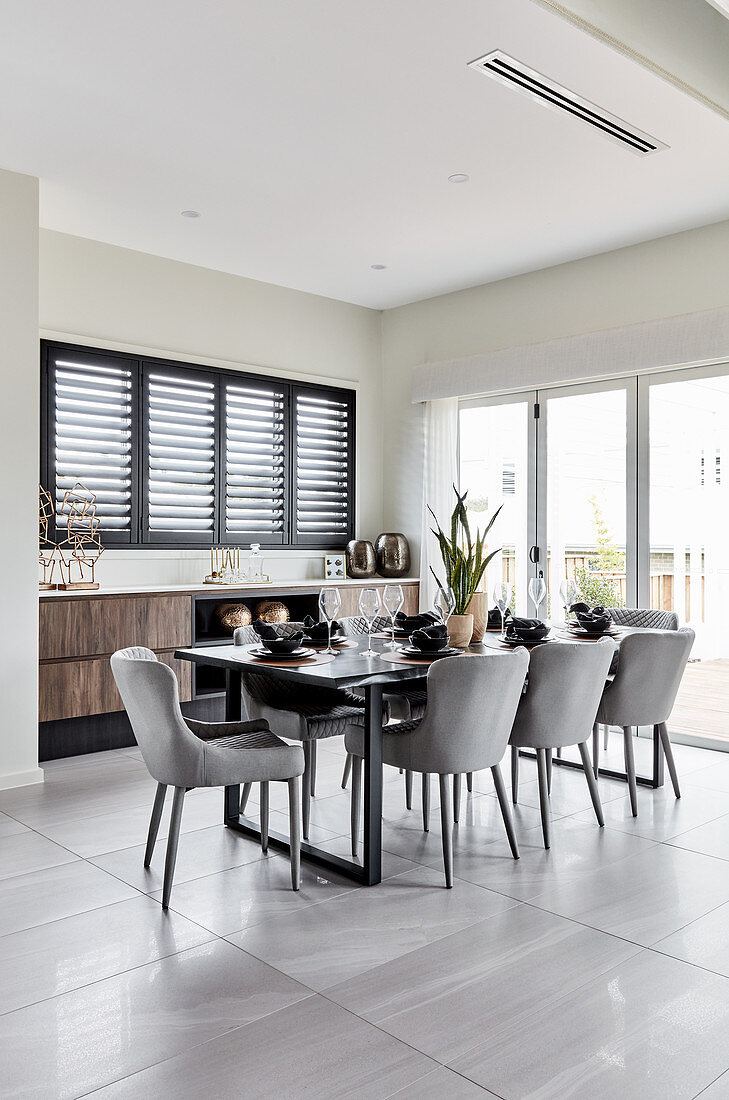 Elegant dining area next to terrace doors