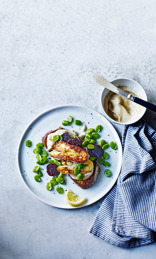 Halloumi and beetroot open sandwich with broad beans