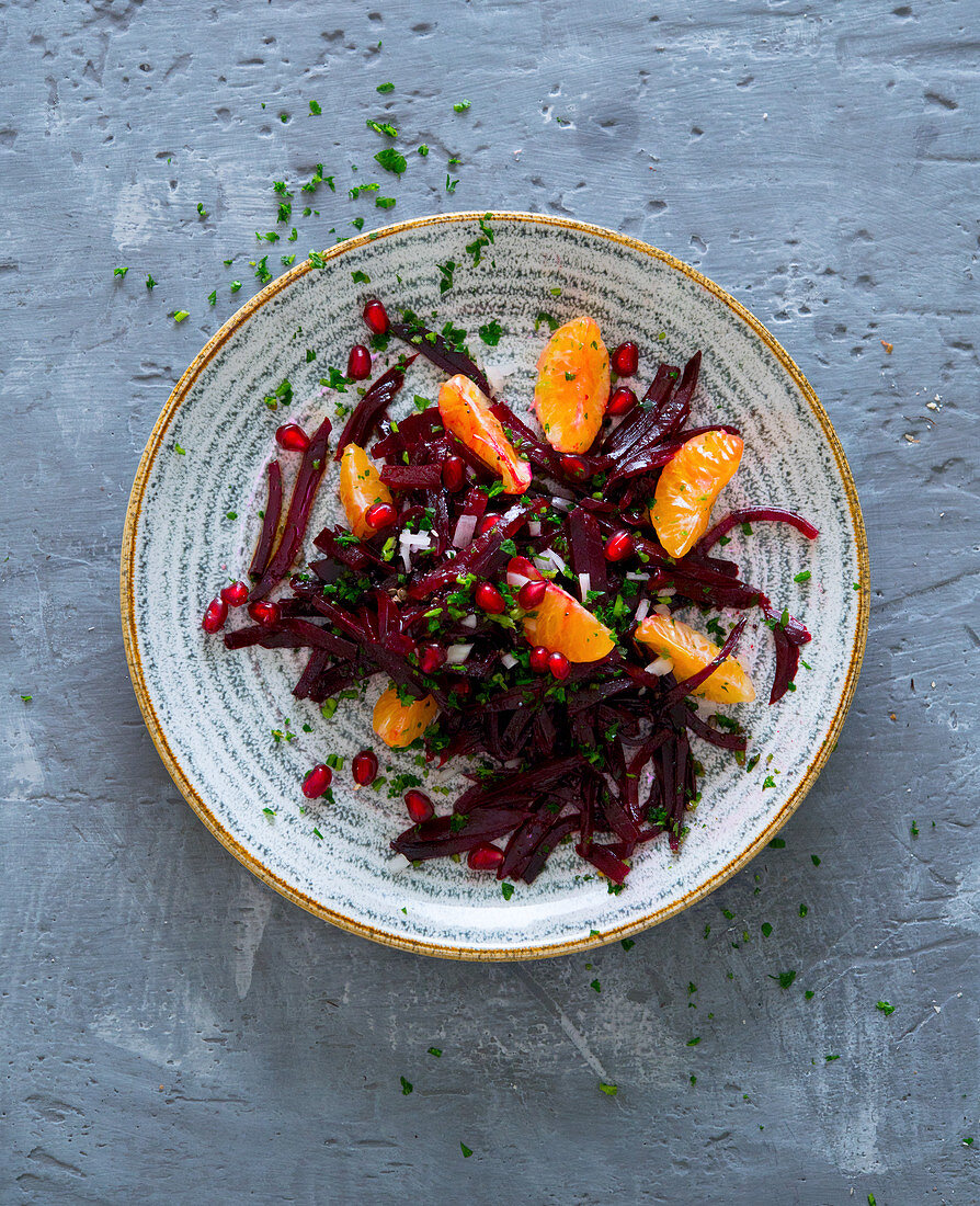 Beetroot salad with tangerines and pomegranate seeds