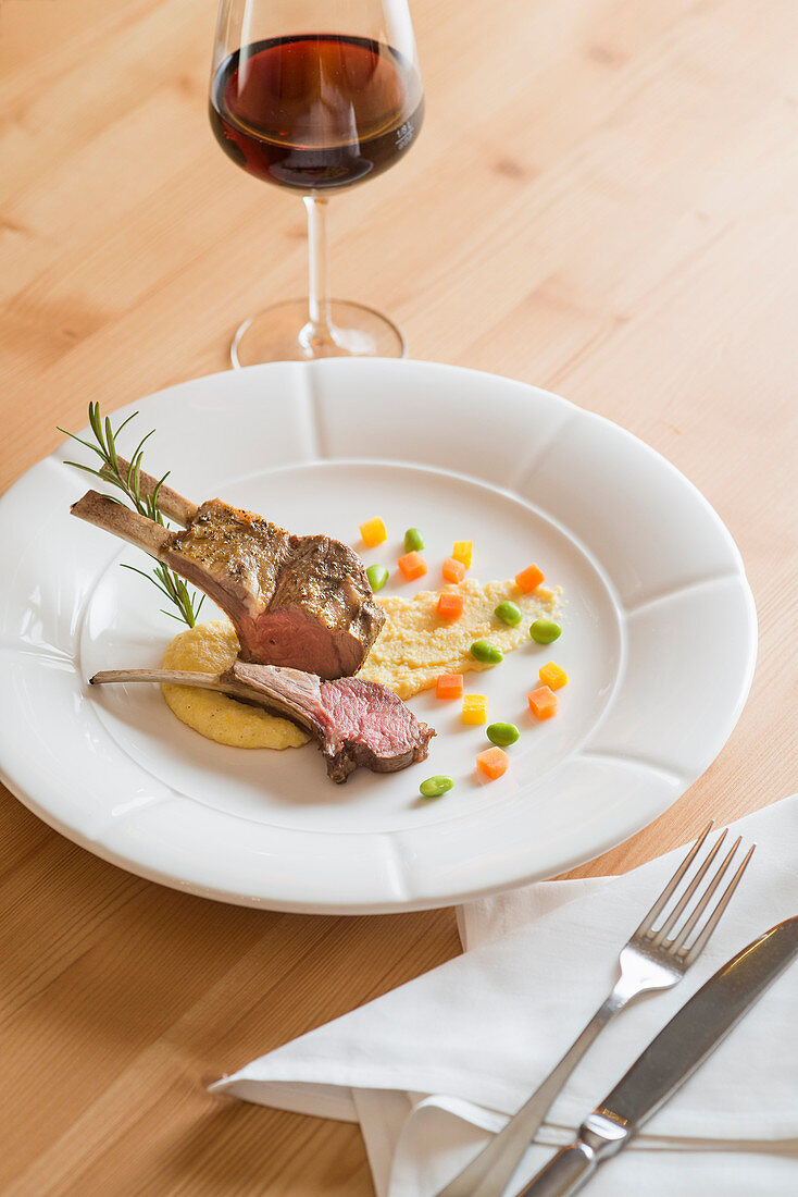 Saddle of lamb with diced vegetables