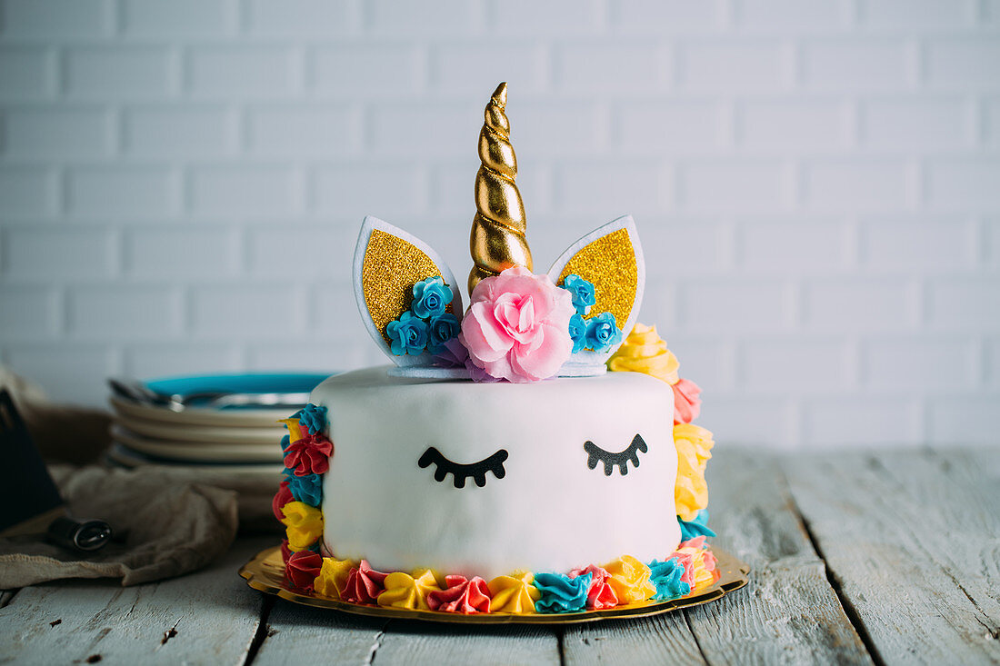 Colourful decorated unicorn cake