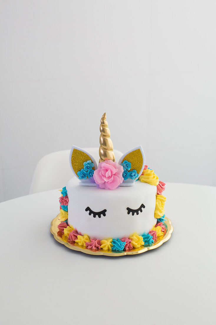 Colourful decorated unicorn cake