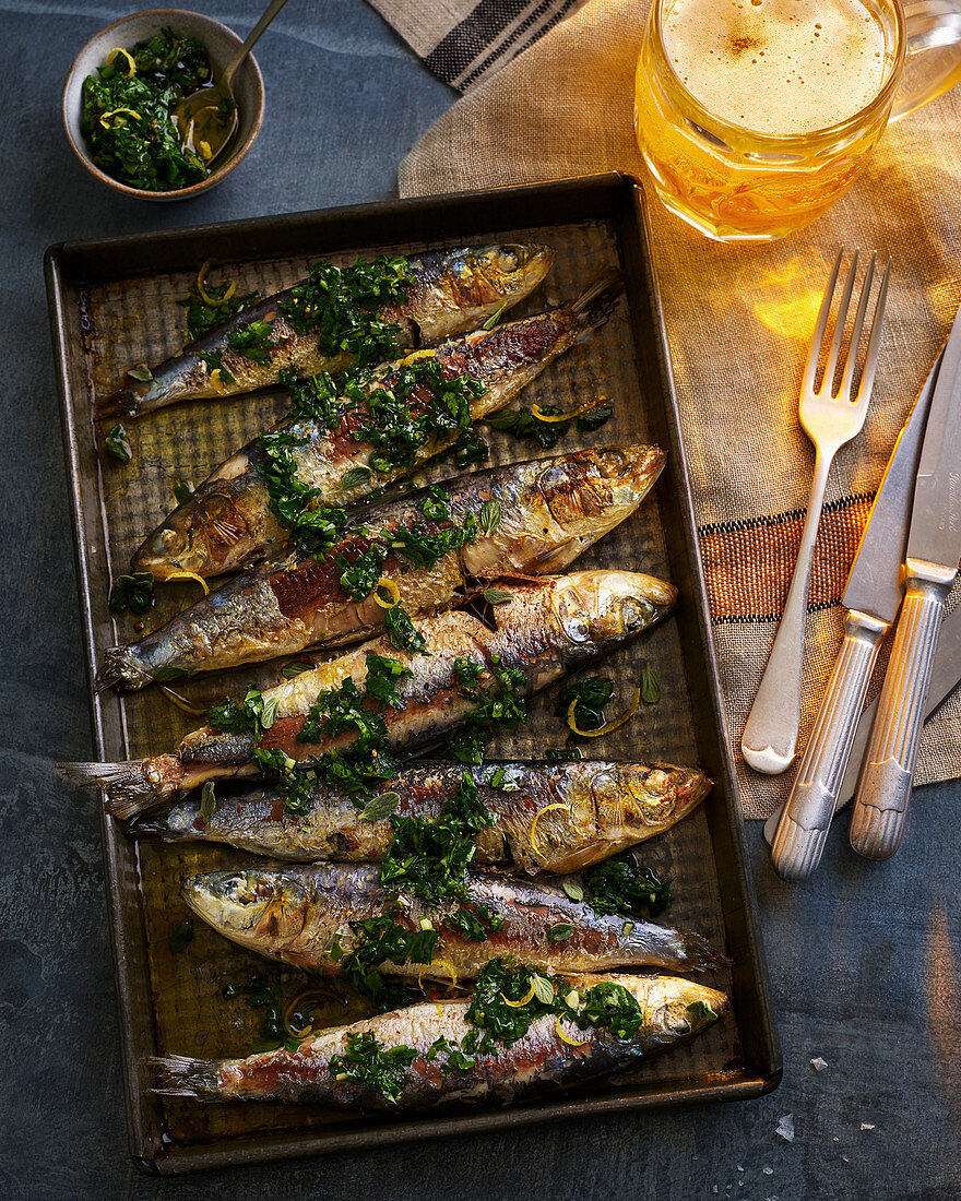 Whole Cooked Sardines With Lemon, Herbs and Beer