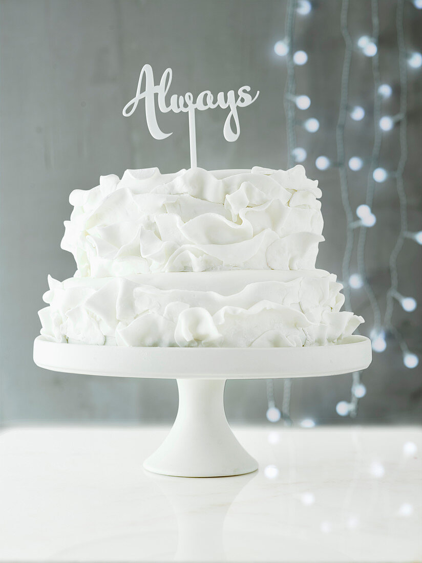 White ruffle wedding cake