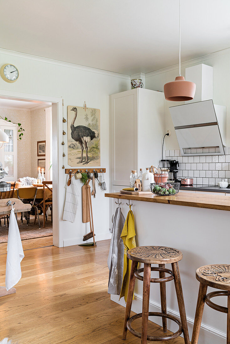 Wooden barstools at kitchen counter