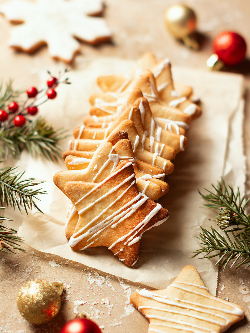 Stack of star sugar cookies on the parchment paper