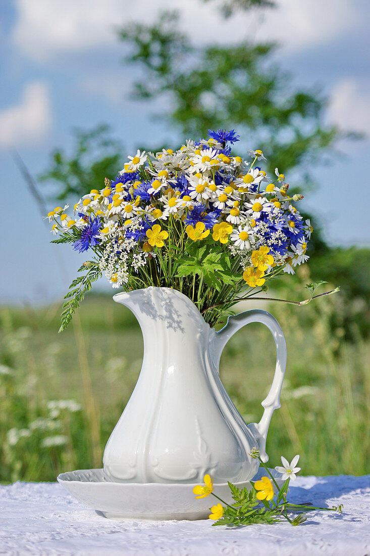Bouquet of wildflowers in jug