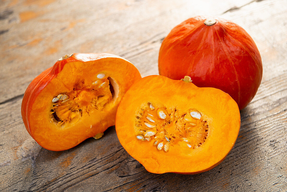 Hokkaido pumpkins, whole and halved