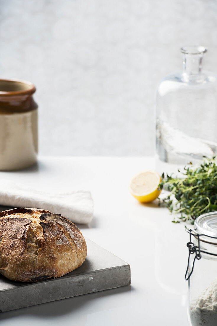 Bread and cutting board on table