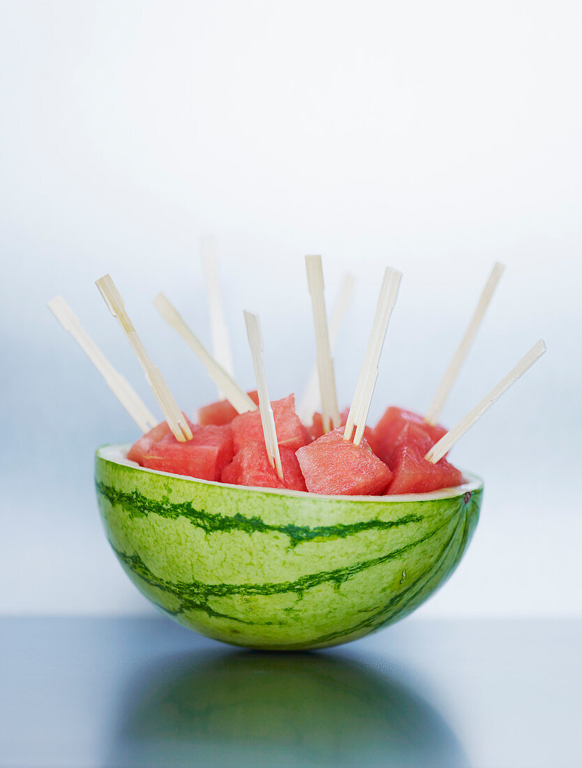 Watermelon cubes on wooden skewers