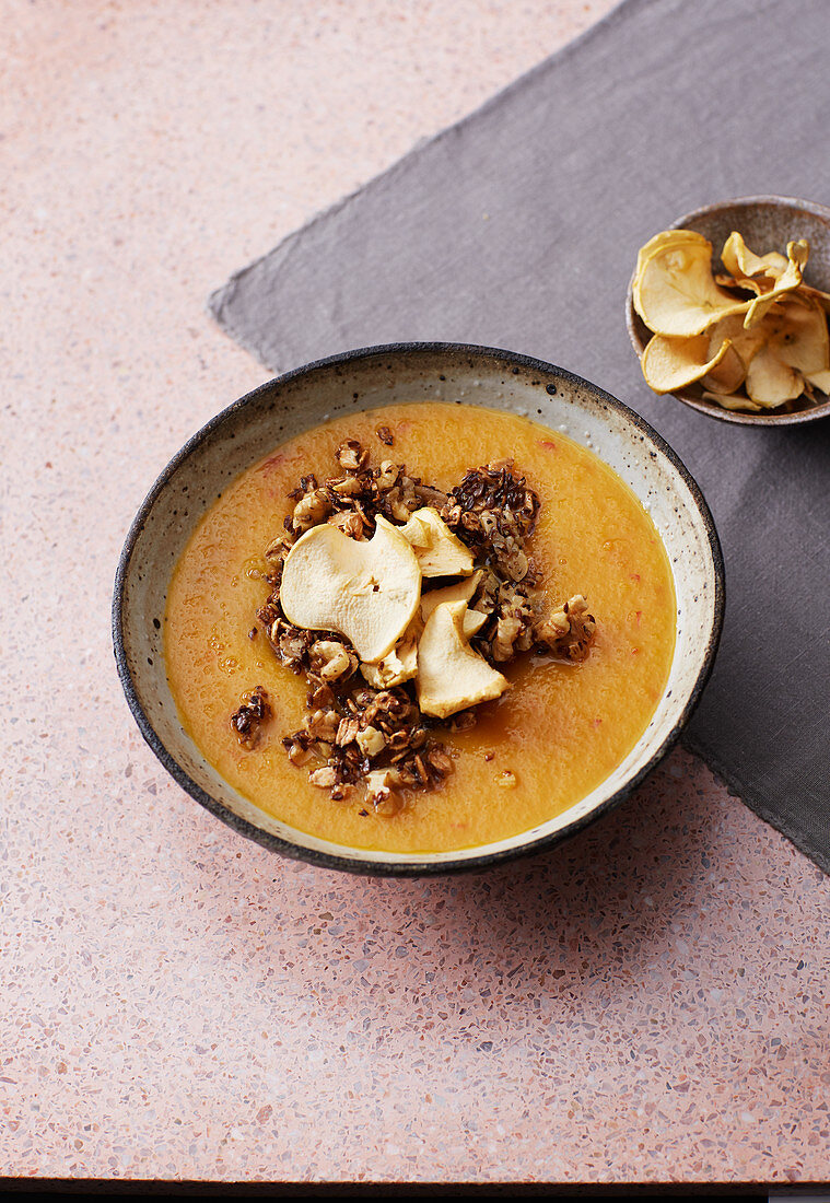 Apple bowl with carrots, sea buckthorn and nut crumbles