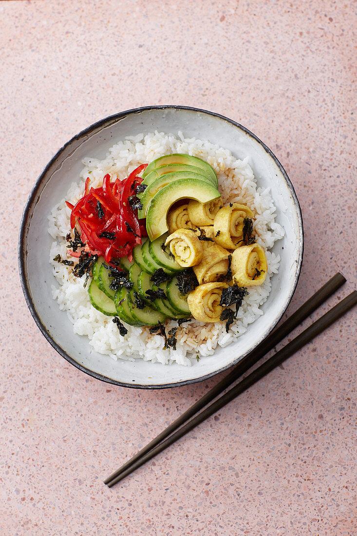 Japanese sushi bowl with egg rolls