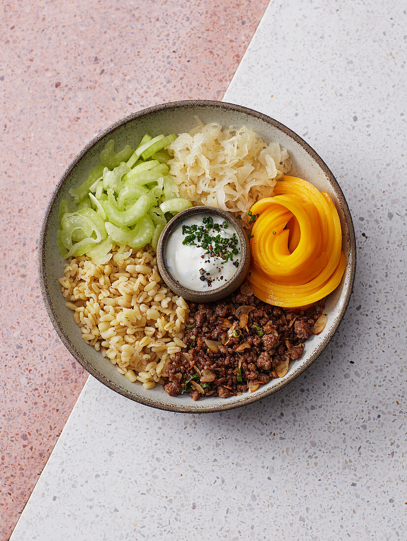 Wheat bowl with leftover minced meat and mango