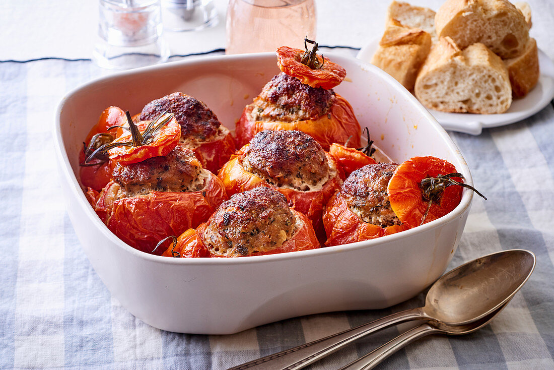 Stuffed tomatoes in a baking dish