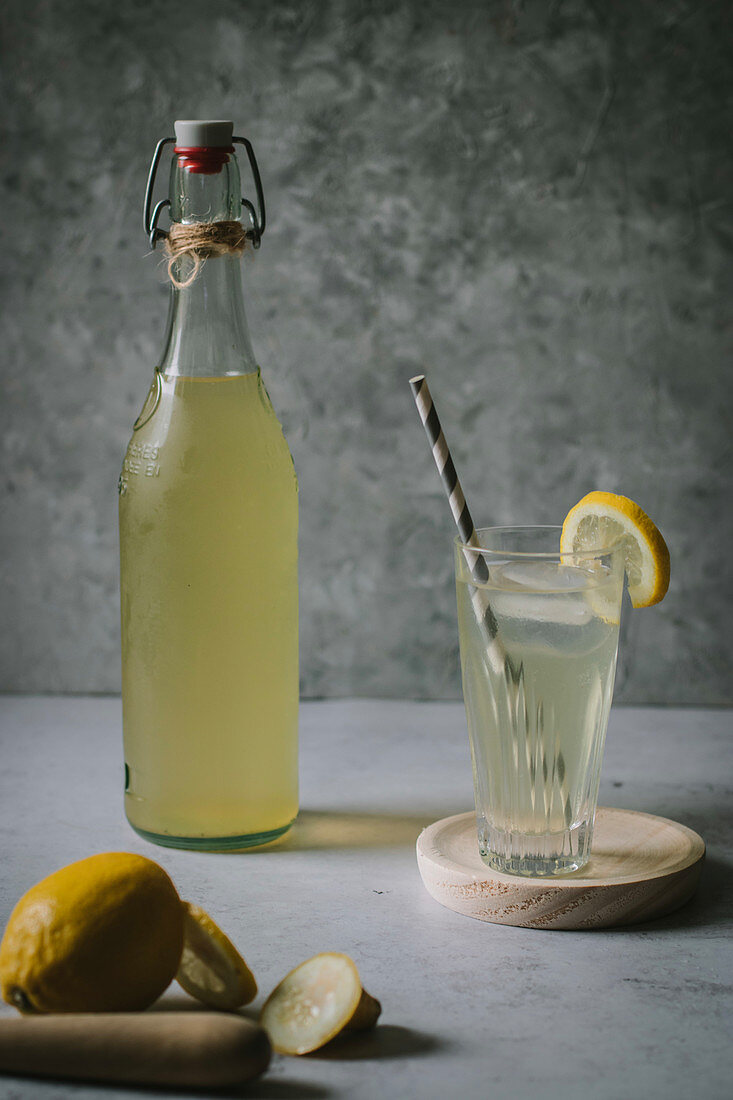 Delicious elderflower syrup in glass and bottle