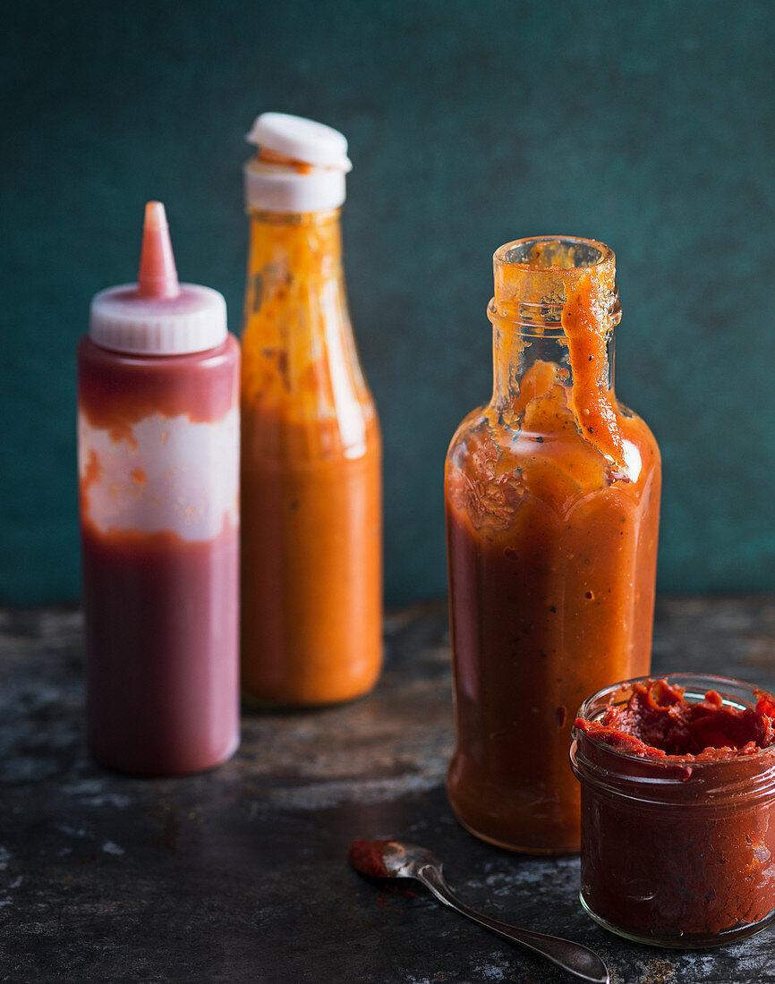 Different types of sauce in bottles