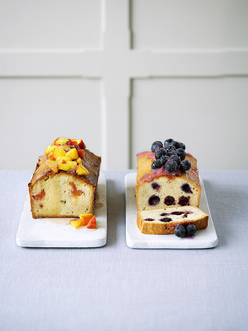 Summer fruit drizzle cake with peaches and blueberries